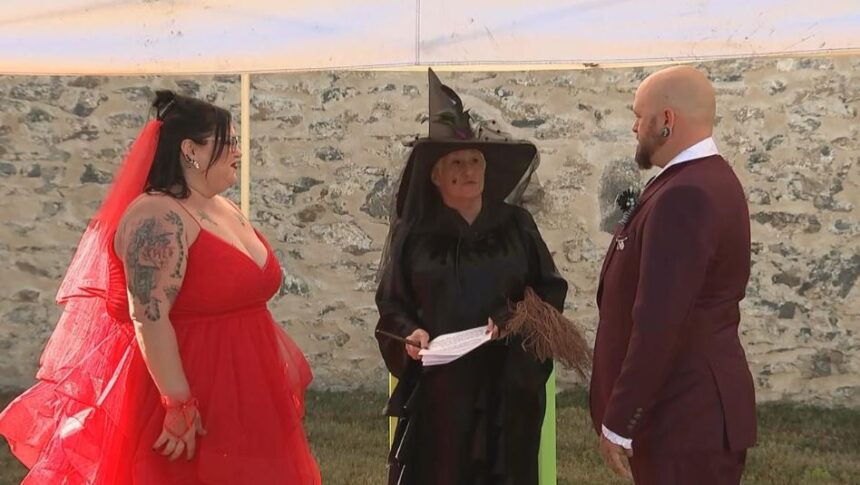 <i>KYW via CNN Newsource</i><br/>New Jersey couple channels Beetlejuice and Lydia for a Halloween wedding.