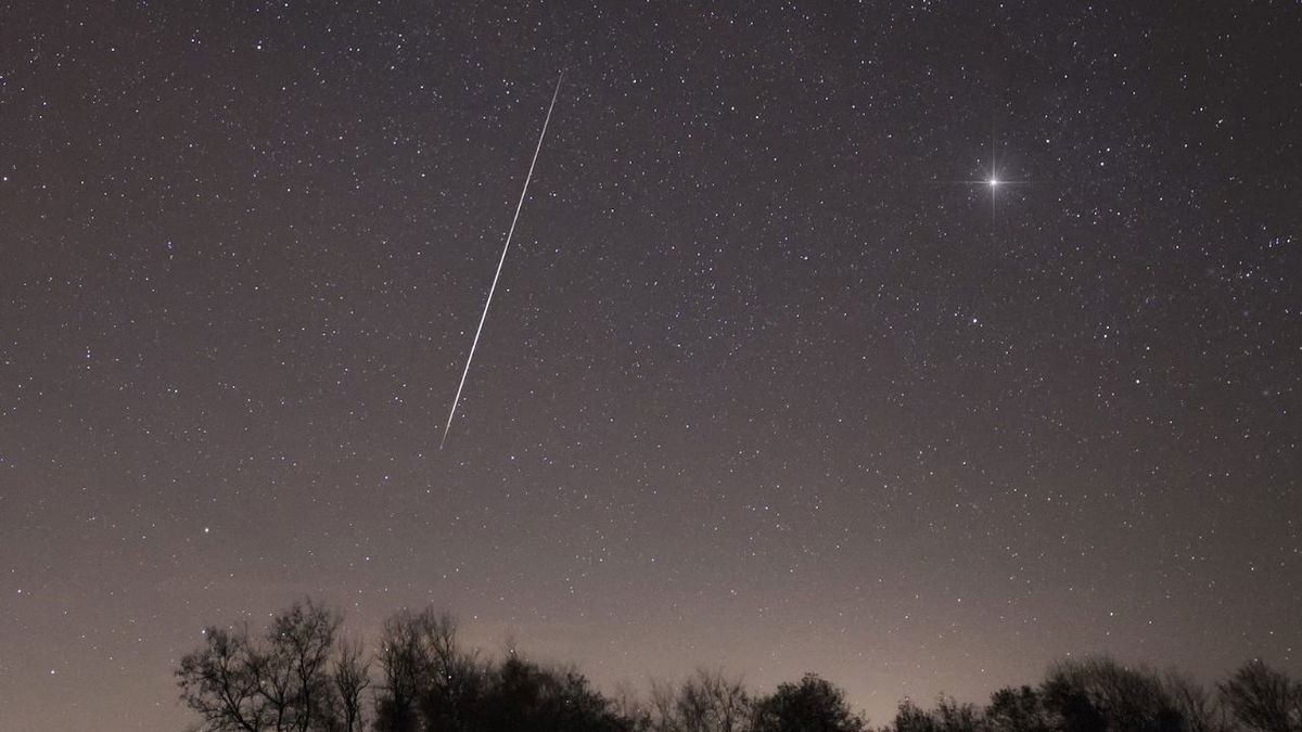 A meteor from one of the Taurid meteor showers streaks across the night sky over Slovenia's Brkini region in November 2015.
