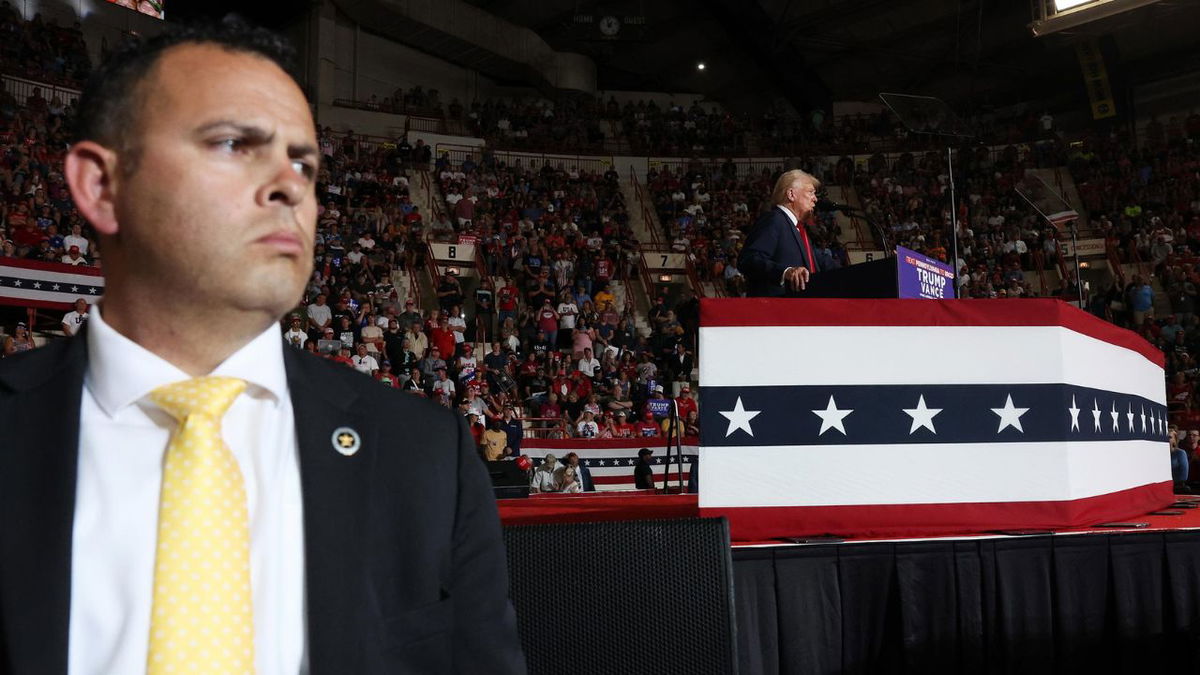 A Secret Service agent watches as Donald Trump speaks at a campaign appearance on July 31 in Harrisburg, Pennsylvania.
