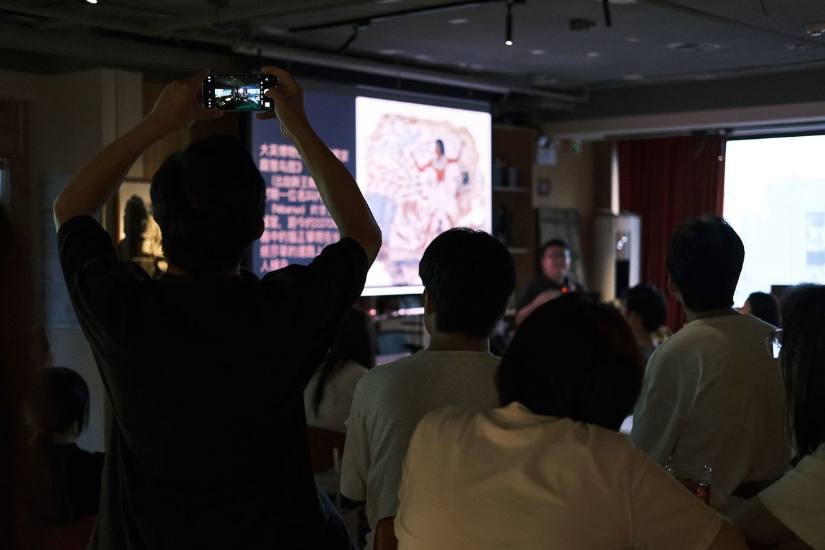 <i>Courtesy Jerry Zhang via CNN Newsource</i><br/>The hottest pub lecture session held by Zhang is themed “Cats and Cat Lovers in Ancient Chinese Paintings.”