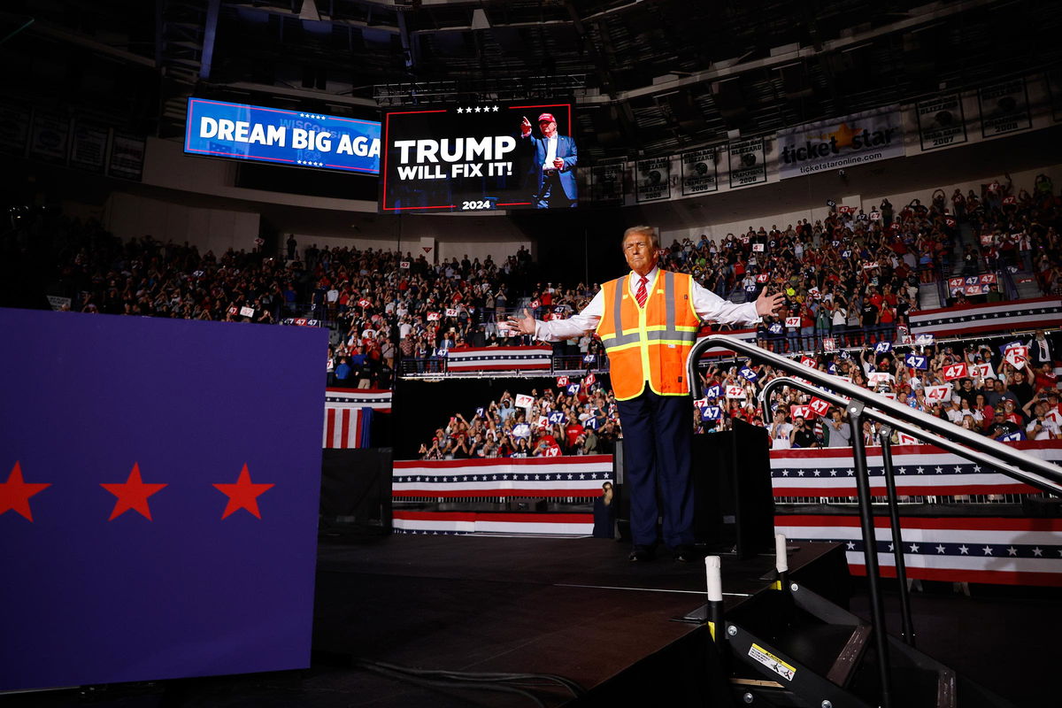 <i>Alex Wroblewski/AFP/Getty Images via CNN Newsource</i><br/>Trump supporters wait for the former president to speak at the Green Bay campaign rally on Wednesday