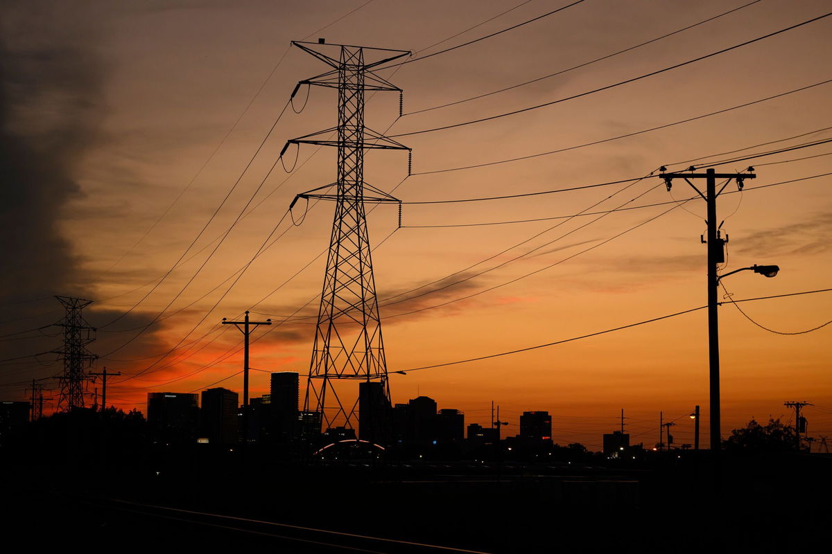 <i>John Amis/AP via CNN Newsource</i><br/>Electrical power lines cross the landscape in August near downtown Nashville.