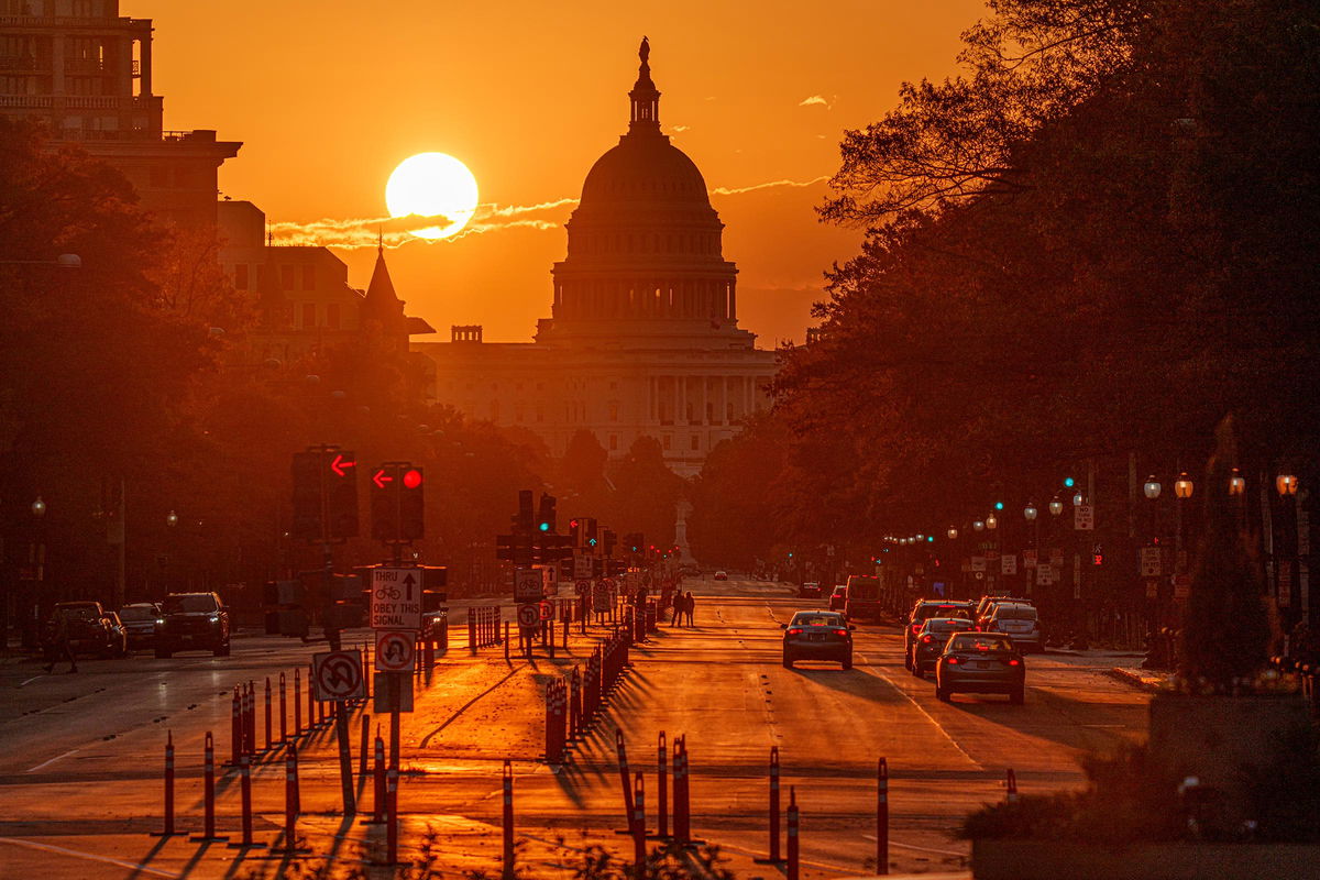 <i>J. David Ake/Getty Images via CNN Newsource</i><br/>The sun rises behind the US Capitol building on October 26