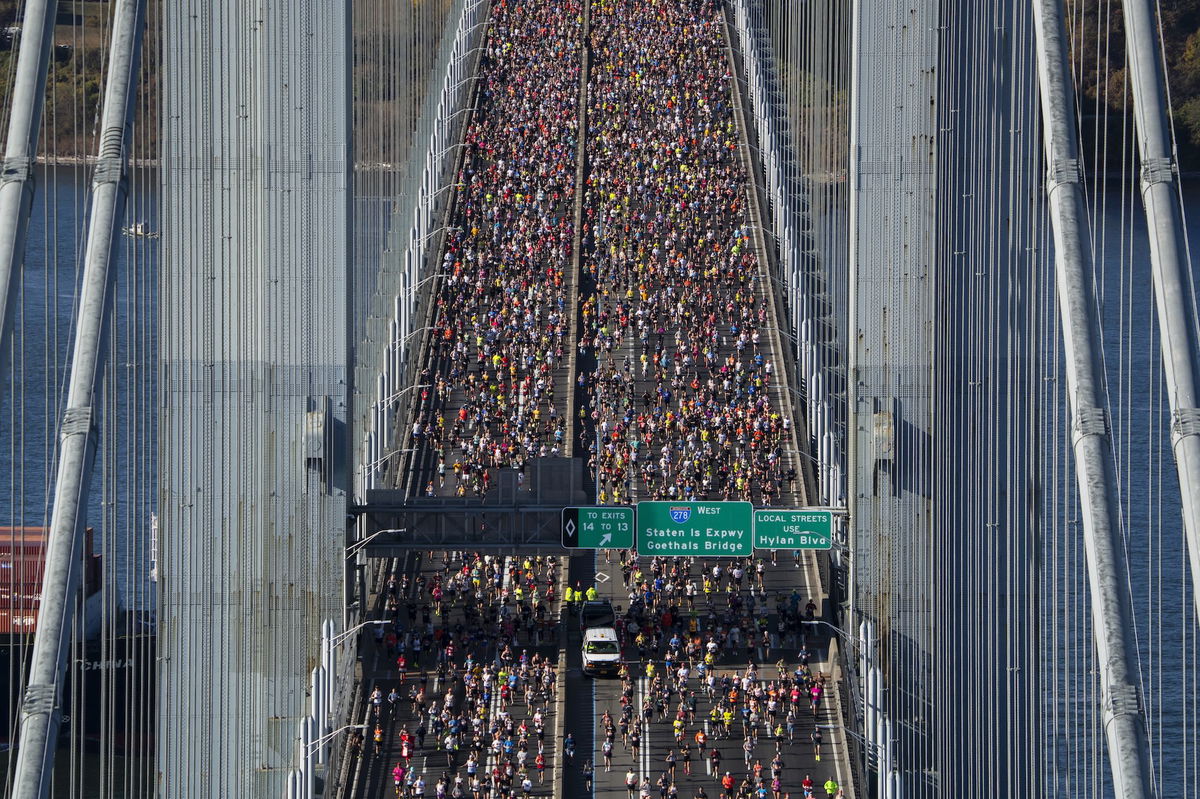 <i>Craig T Fruchtman/Getty Images via CNN Newsource</i><br/>New York City Marathon runners cross the Verrazzano-Narrows Bridge on November 3.