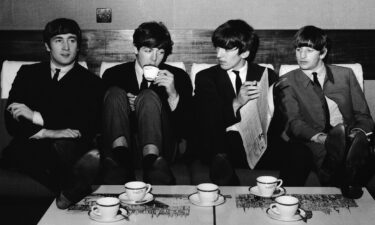 The Beatles take a break from their rehearsals with a coffee after lunch at the Mapleton Hotel in November 1963.