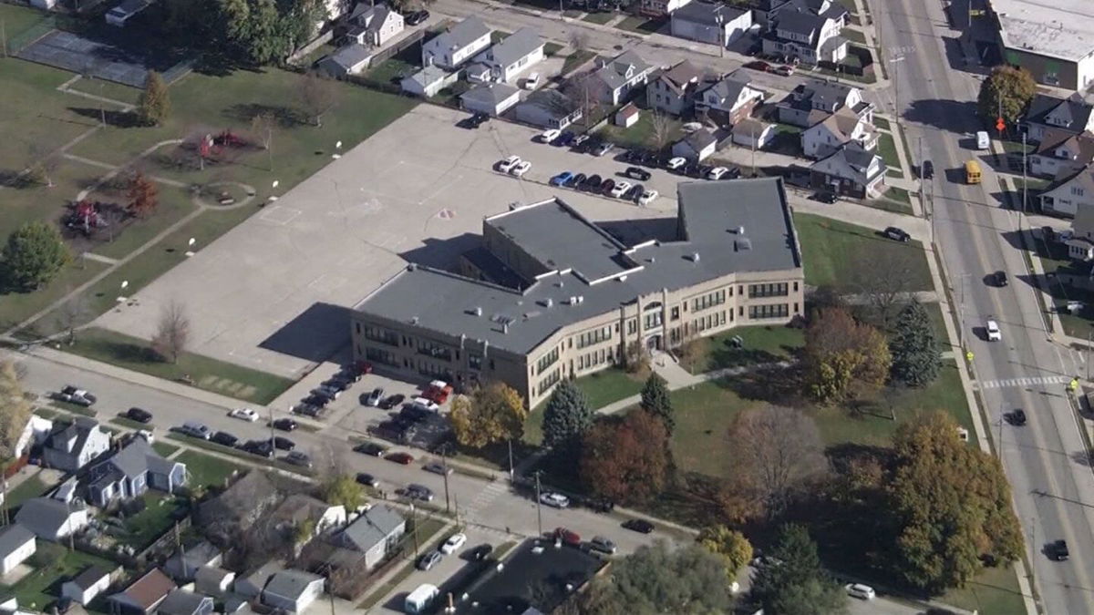 <i>Kenosha Police Dept./WISN via CNN Newsource</i><br/>The Kenosha Police released images of the suspect in the school. Portions of the image were blurred by police.