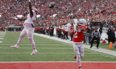 Ohio State receiver Emeka Egbuka catches 11-yard touchdown pass from quarterback Will Howard.