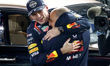 The Mercedes duo of Hamilton and Russell celebrate on the podium.