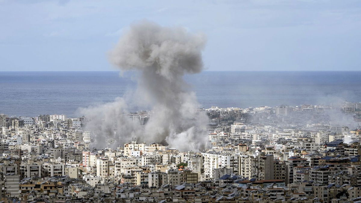 <i>Bilal Hussein/AP via CNN Newsource</i><br/>Smoke rises after an Israeli airstrike on Dahiyeh