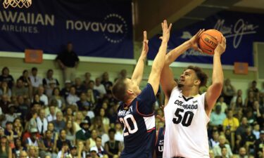 Colorado players celebrate their win at the Maui Invitational.