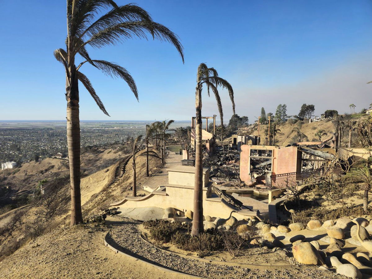 <i>California Office of the Governor via CNN Newsource</i><br/>California Gov. Gavin Newsom checks out fire damage.