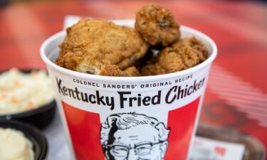 A bucket of fried chicken is arranged for a photograph at a Yum! Brands Inc. Kentucky Fried Chicken (KFC) restaurant in Norwell