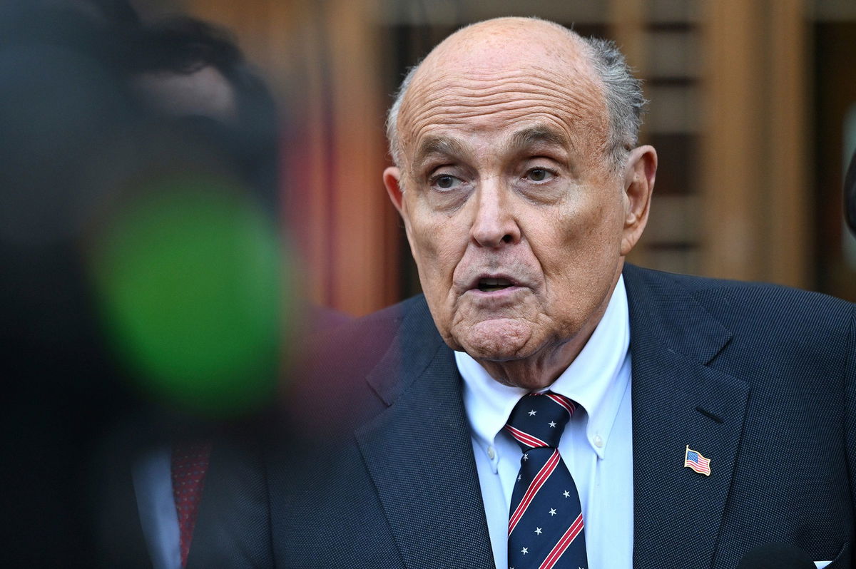 <i>Anthony Behar/ Sipa USA/AP via CNN Newsource</i><br/>Former New York City Mayor Rudy Giuliani seen speaking to members of the press after appearing in federal court in New York on November 7.