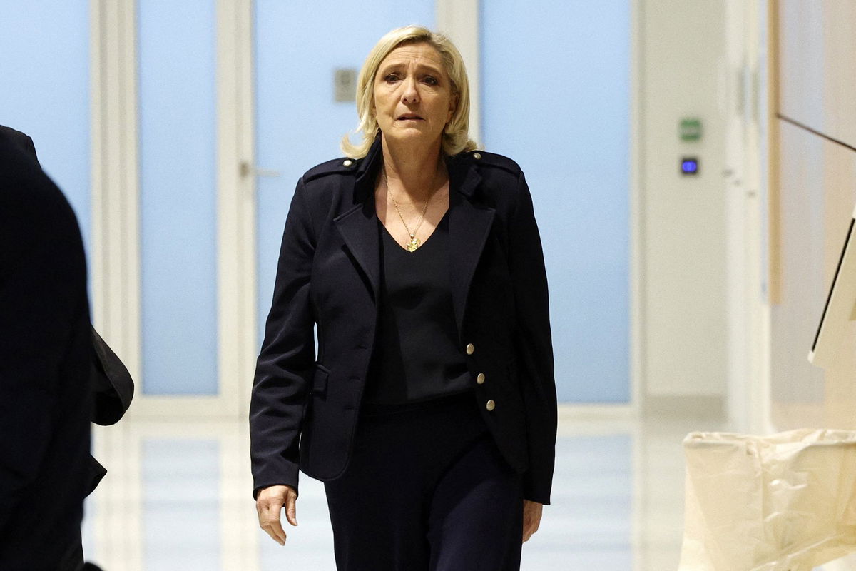 <i>Geoffroy van der Hasselt/AFP/Getty Images via CNN Newsource</i><br/>Le Pen outside the courtroom on Wednesday