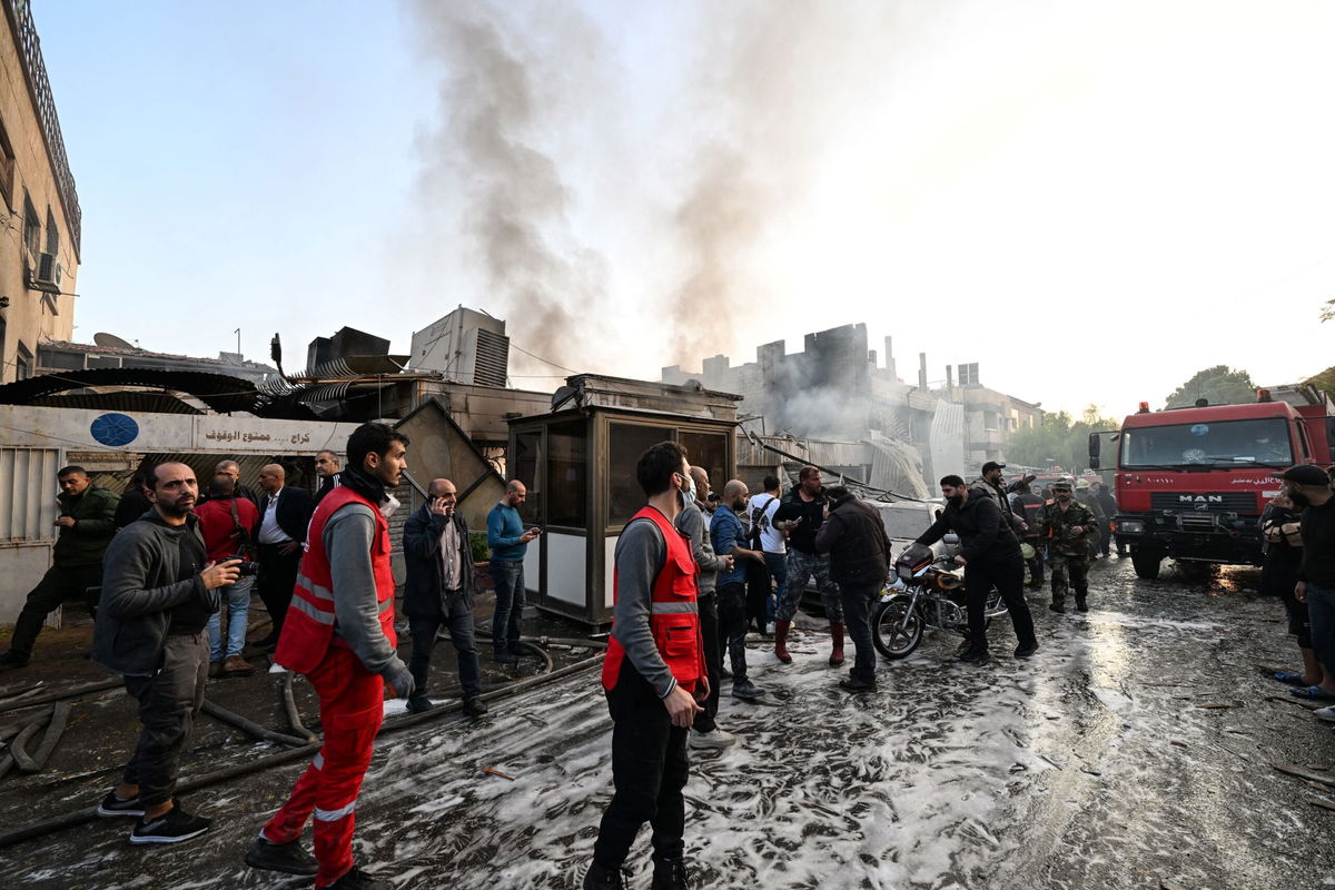 <i>Louai Beshara/AFP/Getty Images via CNN Newsource</i><br/>Damage following an Israeli strike in Damascus is seen on November 14. Syrian state media said at least 15 people were killed.