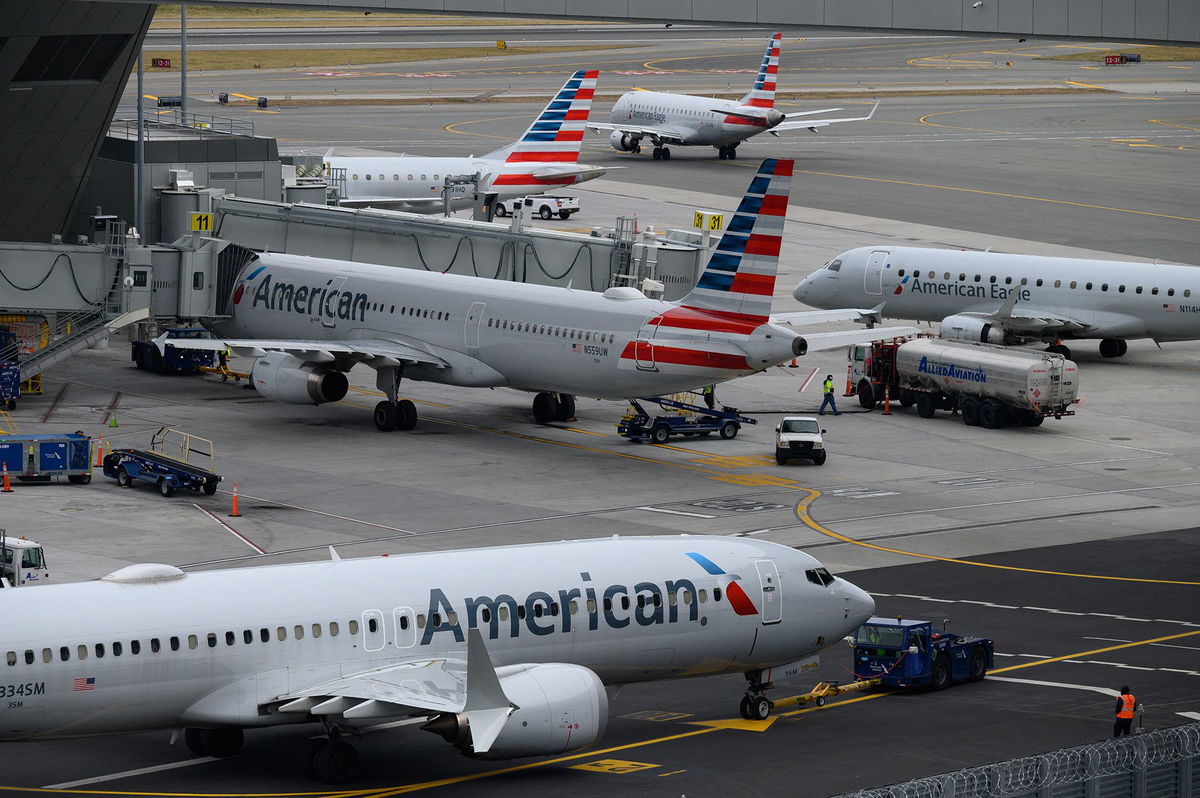 <i>Ed Jones/AFP/Getty Images/FILE via CNN Newsource</i><br/>American Airlines airplanes sit on the tarmac at LaGuardia airport in New York in this file photo.