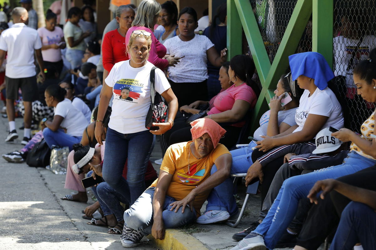 <i>Cristian Hernandez/AP via CNN Newsource</i><br/>Relatives of those detained during a crackdown on protests following the Venezuelan election wait for their loved ones to be released at the Yare 3 prison in San Francisco de Yare on November 16.