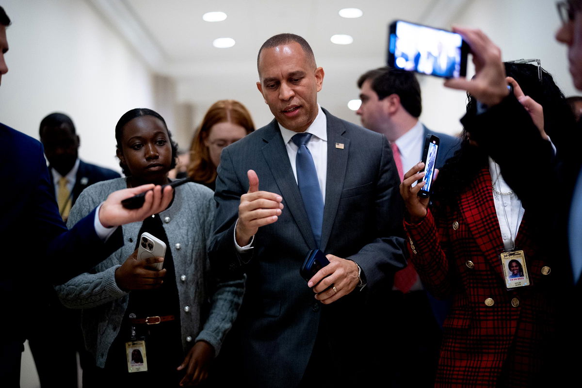 <i>Anna Padilla/Bloomberg/Getty Images via CNN Newsource</i><br/>Rep. Gabe Vasquez watches as Jeffries speaks during a news conference in Albuquerque