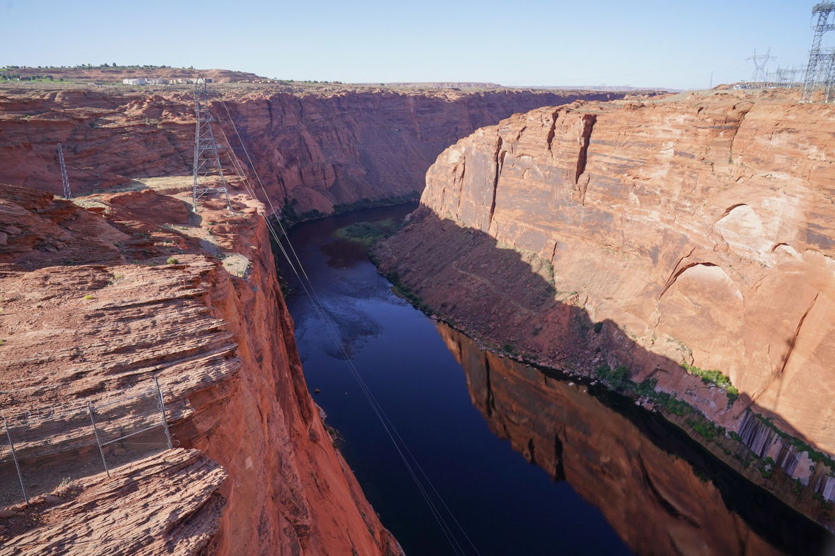 <i>J Sangosti/The Denver PostGetty Images/File via CNN Newsource</i><br/>Bike riders pedal past a section of the Colorado River east of Glenwood Springs