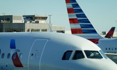 An American Airlines plane sits by a gate in October in Atlanta.