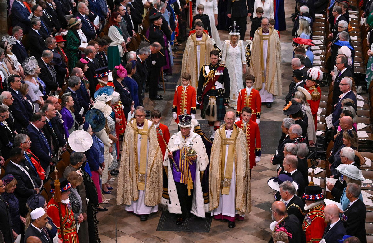 <i>Gareth Cattermole/POOL/AFP/Getty Images/File via CNN Newsource</i><br/>Britain's King Charles III and Queen Camilla depart following their coronation ceremony inside Westminster Abbey in London on May 6