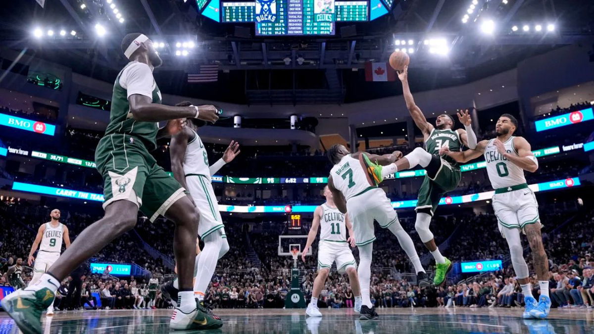 Milwaukee Bucks' Giannis Antetokounmpo is fouled by Boston Celtics' Jaylen Brown during the second half of an NBA basketball game Sunday, Nov. 10, 2024, in Milwaukee. Morry Gash/AP