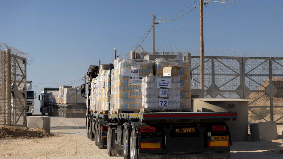 Trucks carrying humanitarian aid cross into the Gaza Strip on November 11 at the Erez Crossing.
