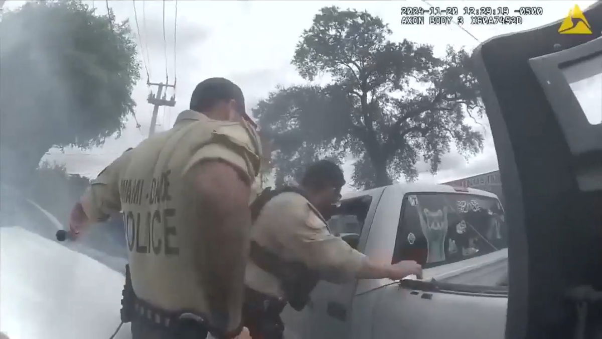 <i>WSVN via CNN Newsource</i><br/>Officer-worn body camera video shows yet another view of a pickup truck driver’s crash course in a Southwest Miami-Dade parking lot as he attempted to evade police following a high-speed pursuit.