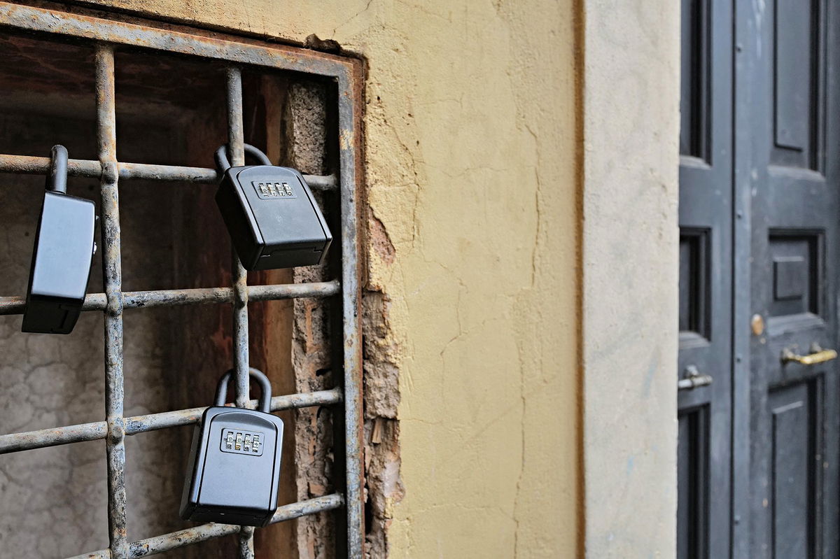 <i>Andreas Solaro/AFP/Getty Images via CNN Newsource</i><br/>Key boxes protected by a numerical code hang outside an apartment door in Rome's Trastevere district.