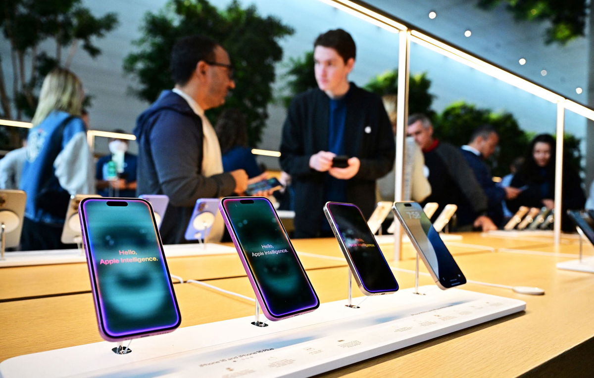 <i>Frederic J. Brown/AFP/Getty Images/File via CNN Newsource</i><br/>New tariffs could make iPhones more expensive. During this busy holiday shopping season