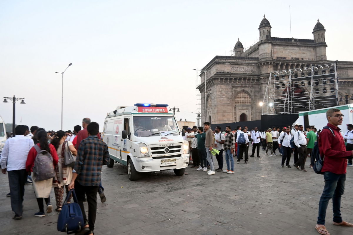 <i>Imtiyaz Shaikh/Anadolu/Getty Images via CNN Newsource</i><br/>Passengers receive medical attention after a boat capsized off the coast in Mumbai