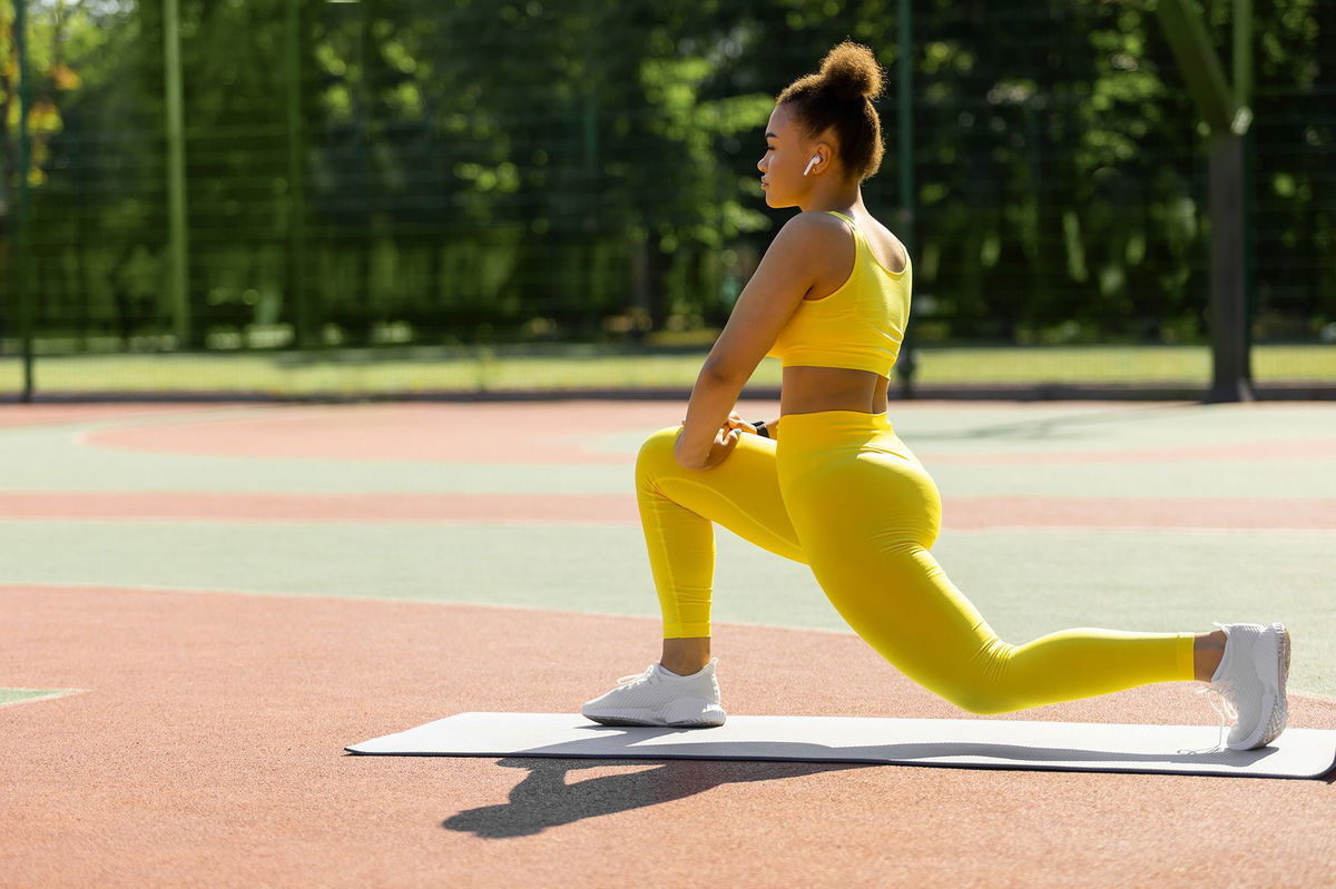 <i>Natalya Ugryumova/iStockphoto/Getty Images via CNN Newsource</i><br/>Stretching provides for a greater range of motion and flexibility. A pigeon pose can be a great post-workout stretch for hip flexors and glutes.