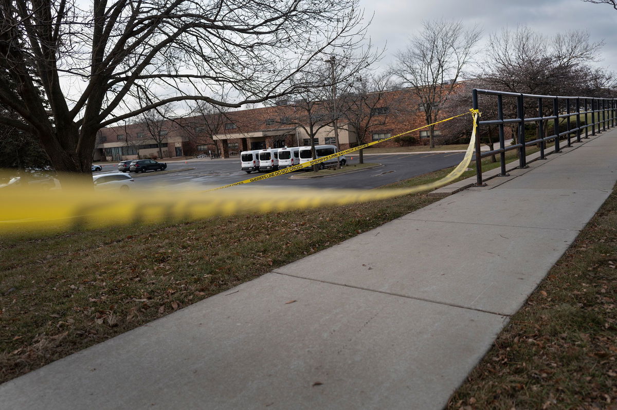 <i>Scott Olson/Getty Images via CNN Newsource</i><br/>Crime scene tape continues to be stretched around Abundant Life Christian School as police continue to investigate.