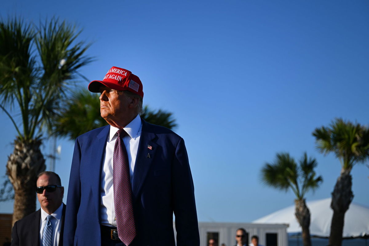 <i>Brandon Bell/Getty Images via CNN Newsource</i><br />President-elect Donald Trump attends a viewing of the SpaceX Starship rocket on November 19 in Brownsville