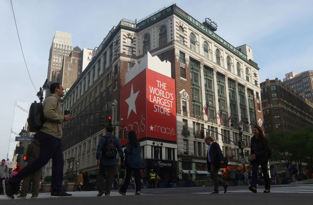 <i>Gary Hershorn/Getty Images via CNN Newsource</i><br/>People walk along 34th street in front of the Macy's Herald Square department store on May 6 in New York. Macy’s is sitting on real estate that is more valuable than the company itself.