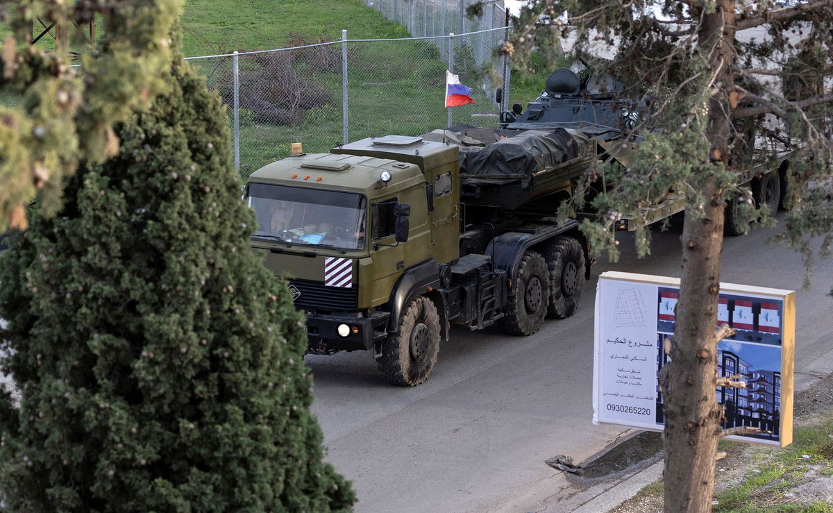 <i>Umit Bektas/Reuters via CNN Newsource</i><br/>A Russian military vehicle heads towards Hmeimim air base in coastal Latakia