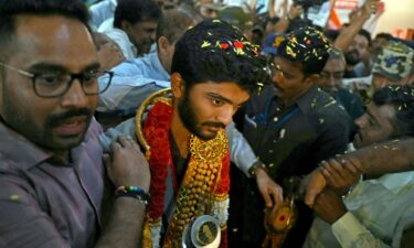 Gukesh Dommaraju is welcomed home upon his arrival at the Chennai International Airport on December 16 after his win at the FIDE World Chess Championship in Singapore.