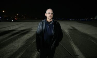 Paul Whelan stands on the tarmac as he arrives at Joint Base Andrews in Maryland on August 1.