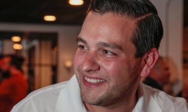 Miami-Dade County Commission District 6 candidate Kevin Marino Cabrera celebrates at Beat Culture Brewery in Miami after defeating Coral Gables Commissioner Jorge Fors in November 2022.