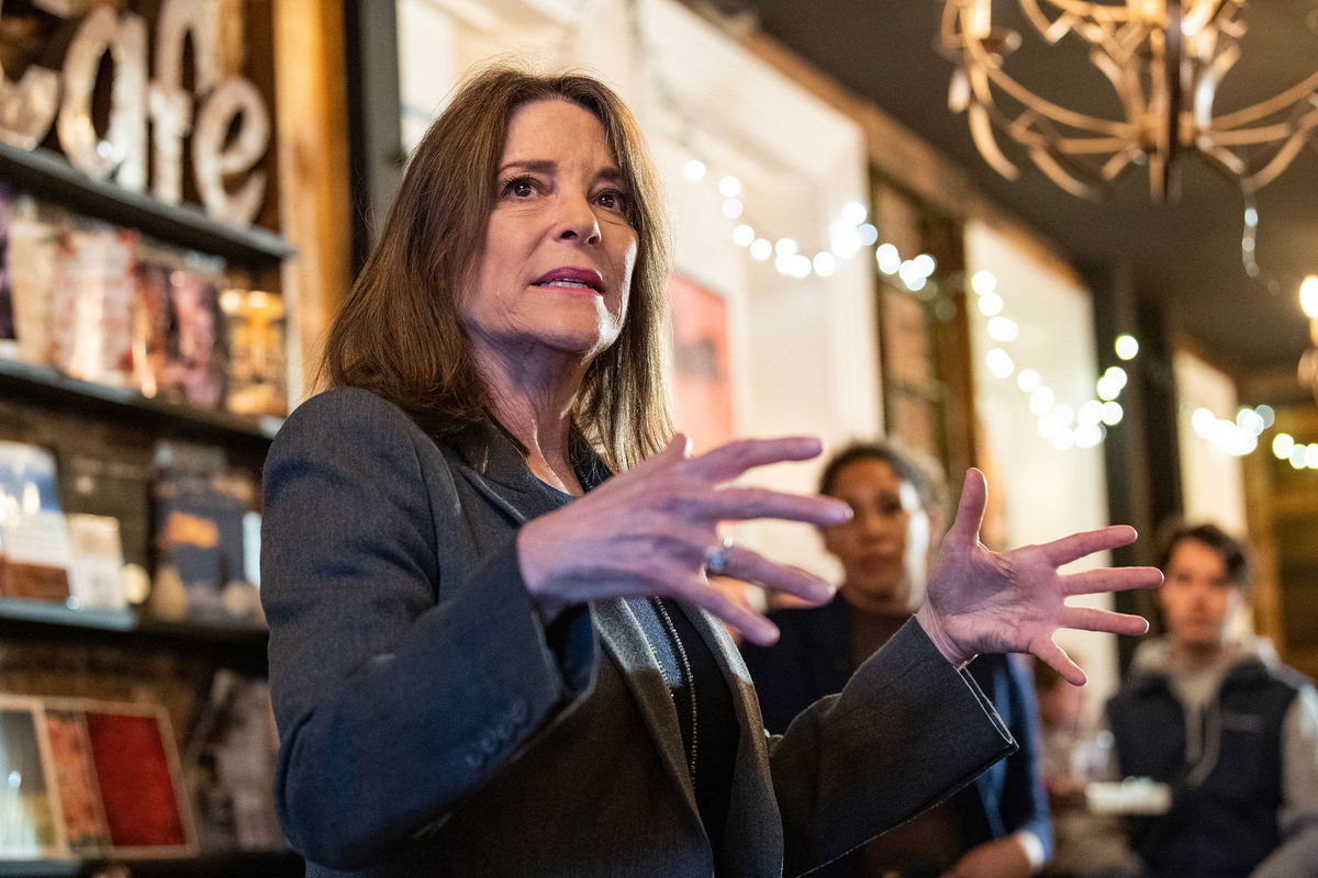 <i>Joseph Prezioso/AFP/Getty Images via CNN Newsource</i><br/>Marianne Williamson campaigns at a coffee shop in Portsmouth