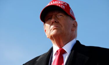 Donald Trump arrives for a campaign rally on November 3