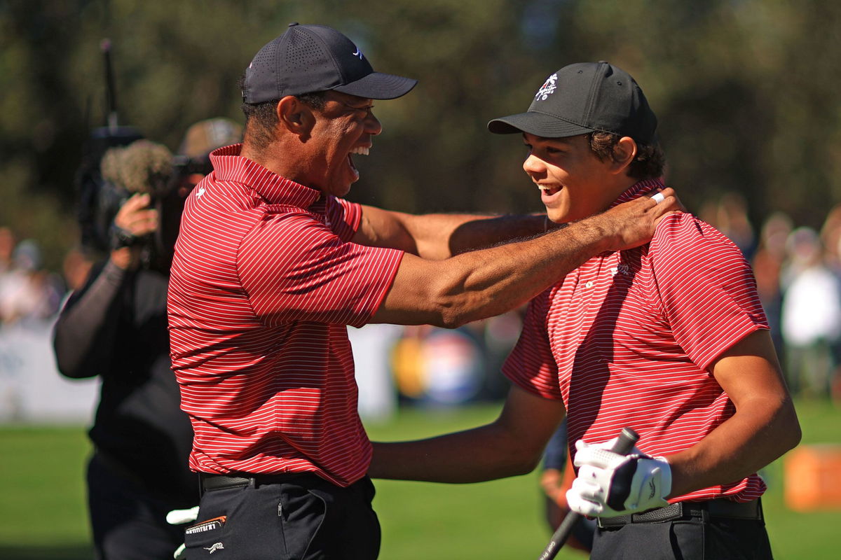 <i>Mike Ehrmann/Getty Images via CNN Newsource</i><br/>Tiger Woods and his son Charlie Woods celebrate after Charlie hit a hole-in-one at the PNC Championship.