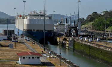 A ship is guided through the Panama Canal's Miraflores locks near Panama City in April 2023.