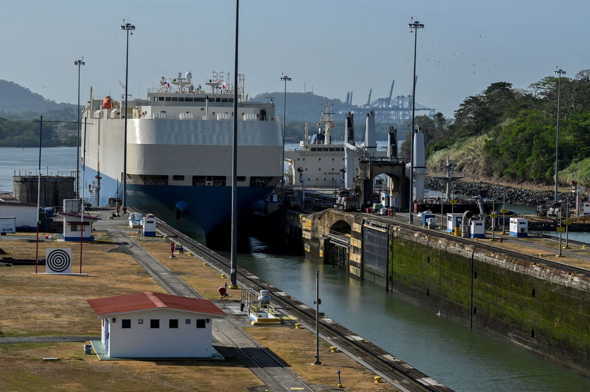 <i>Luis Acosta/AFP/Getty Images via CNN Newsource</i><br/>A ship is guided through the Panama Canal's Miraflores locks near Panama City in April 2023.