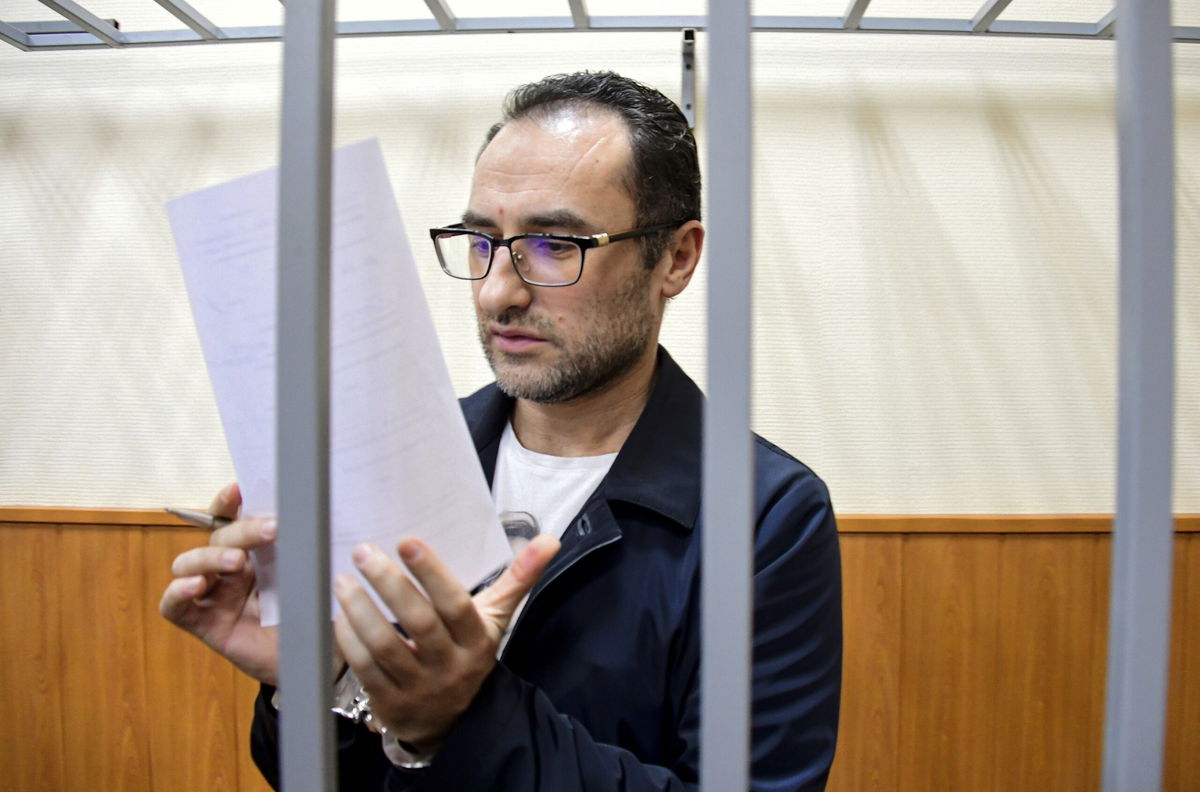 <i>Igor Ivanko/Kommersant Publishing House/AP via CNN Newsource</i><br/>Eugene Spector is pictured behind bars in a Moscow courtroom in February 2020.