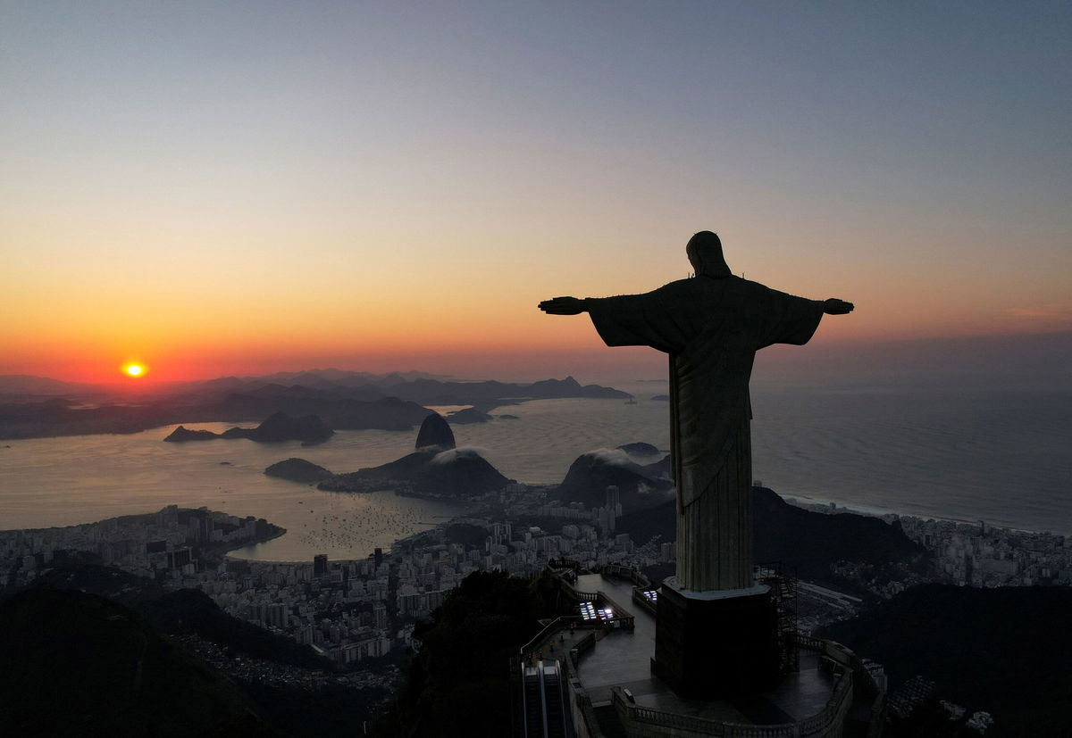 <i>Bruna Prado/AP via CNN Newsource</i><br/>Rio de Janeiro's Archbishop Orani Tempesta leads a Catholic Mass at the Christ the Redeemer statue in Rio de Janeiro on May 30.