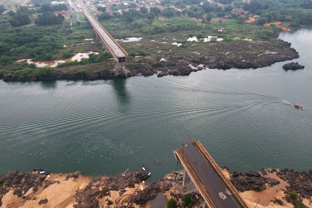 <i>Mauricio Marinho/Reuters via CNN Newsource</i><br/>A drone view shows a collapsed bridge between Aguiarnopolis and Estreito