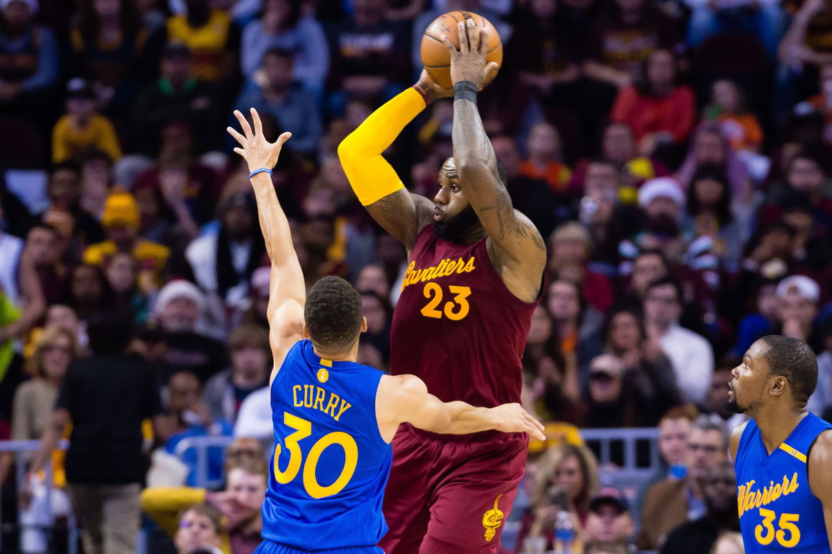 <i>David Liam Kyle/NBAE/Getty Images via CNN Newsource</i><br/>Kevin Durant shoots the ball in his first game as a Warrior against the defending champs.