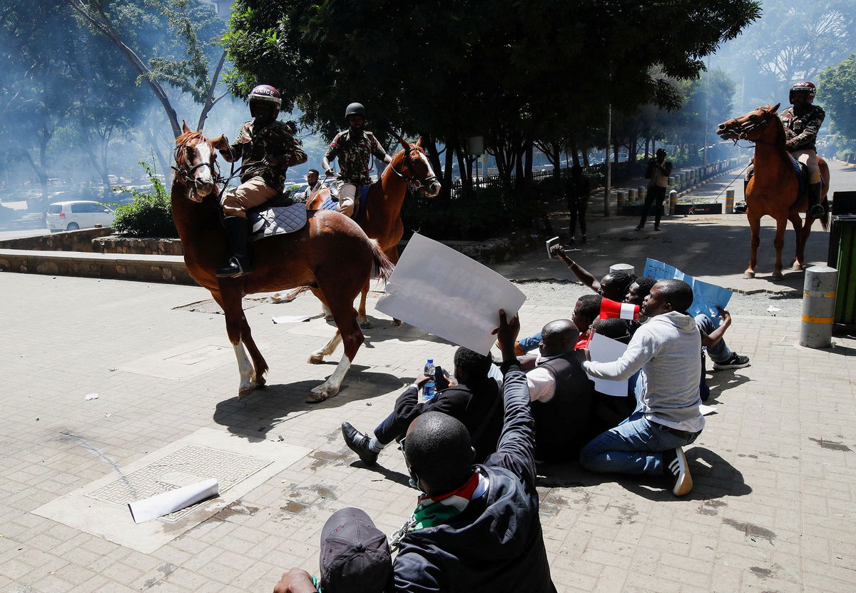 <i>Daniel Irungu/EPA-EFE/Shutterstock via CNN Newsource</i><br/>A mounted anti-riot police officer tries to escape the teargas used to disperse activists during a protest against the rise in alleged abductions of government critics in Nairobi