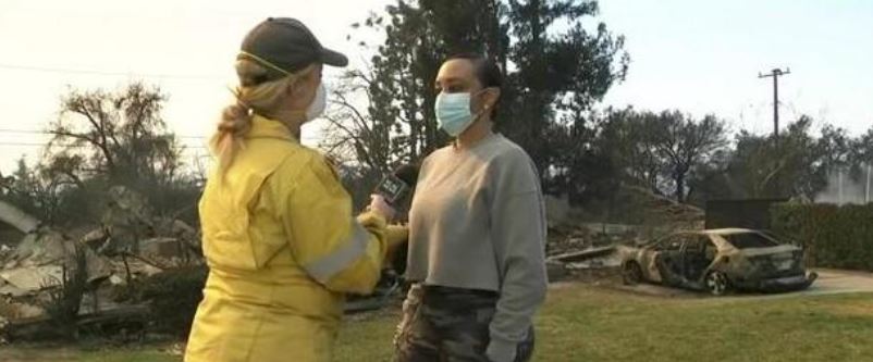 <i>KCAL/KCBS via CNN Newsource</i><br/>Kimiko Nickerson stands in front of what used to be her childhood home in Altadena